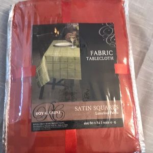 Red fabric tablecloth by Royal Crest size 60x84